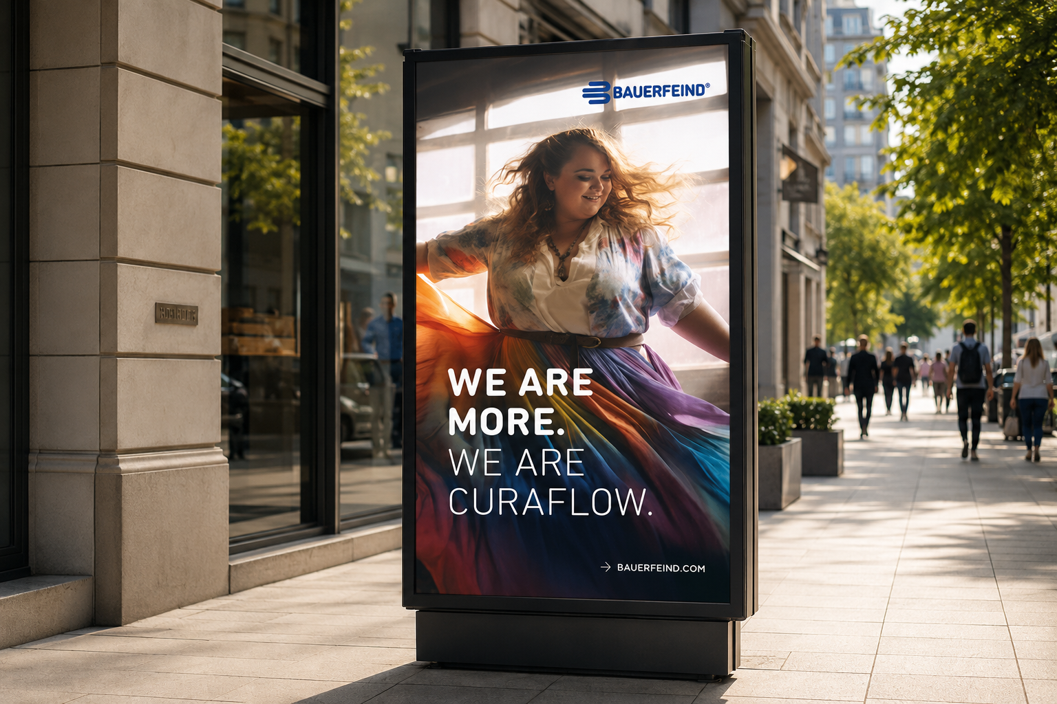 We Are More campaign artwork for VenoTrain curaflow displayed on a city street advertising panel